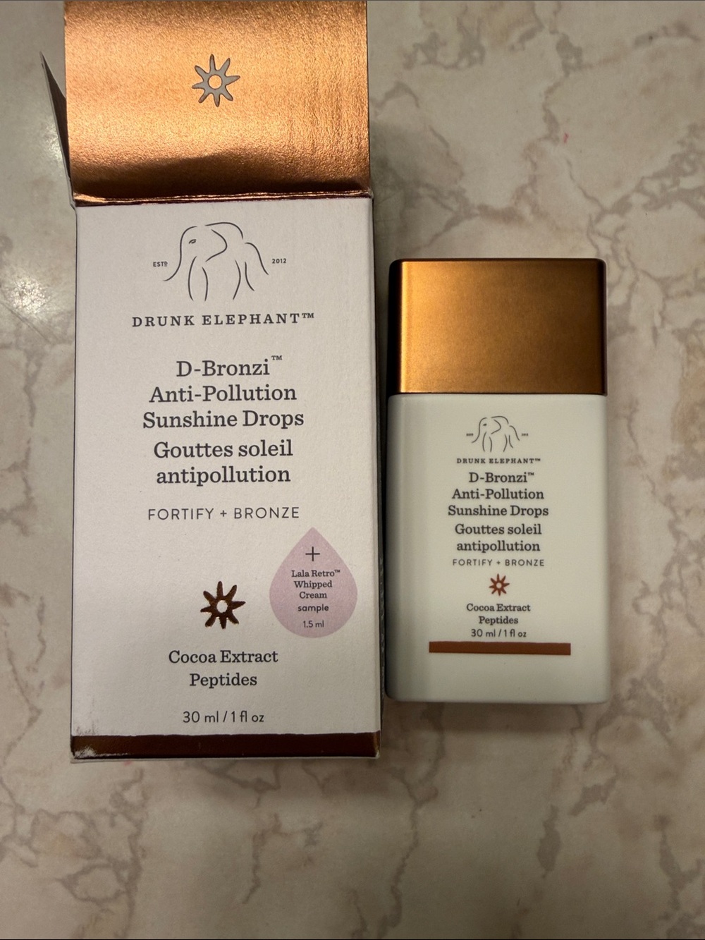 Drunk Elephant D-Bronzi Anti-Pollution Sunshine Drops – Bronze & White Packaging